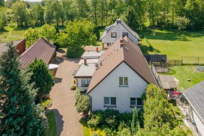 Einfamilienhaus, zwei Wohnungen und fantastisches Grundstück in Kolkwitz OT Babow - Am Kanal!