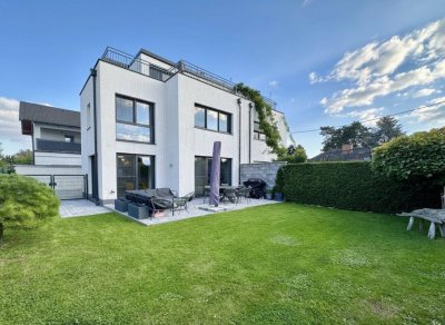 Modernes Traumhaus mit großer Dachterrasse und ausgebautem Wohnkeller, Seeblick inklusive!