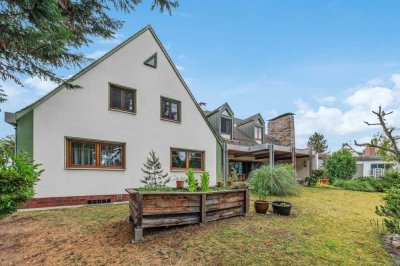 Mehrfamilienhaus mit Laden, Werkstatt und vielen Extras 
auf herrlich großem Grundstück.

Erlange