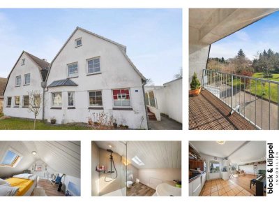 Familienfreundliche Maisonette-Wohnung mit 5 Zimmern, Balkon, Garten und Garage