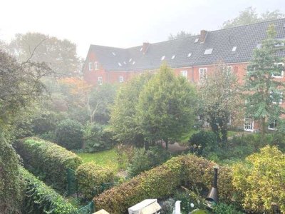 Modernes Apartment mit Balkon im beliebten, zentral gelegenen Faulenquartier mit Blick in die Gärten