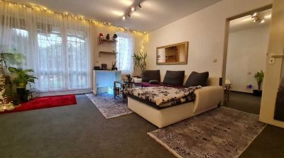 Attraktive Kapitalanlage! Vermietete 2-Zimmer-EG-Wohnung mit Terrasse & TG-Stellplatz in Neureut