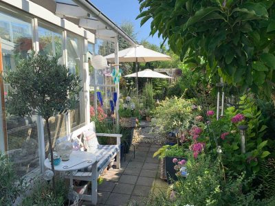 ***Töging a. Inn: Einzigartige Erdgeschosswohnung mit großem Wintergarten in bevorzugter Lage***