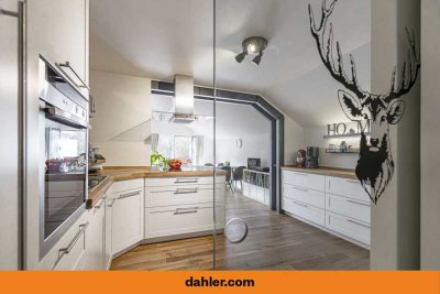 Leben im Badeteil von Bad Tölz: Moderne Dachgeschosswohnung mit sonnigem Balkon