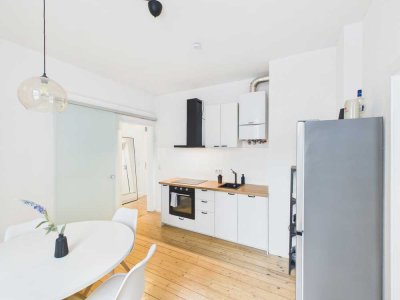 Wohntraum mit Altbau-Charme und moderner Offenheit