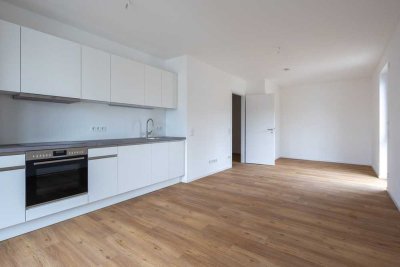 Kompakte 1-Zimmer-Wohnung mit Einbauküche und Loggia zum Erstbezug