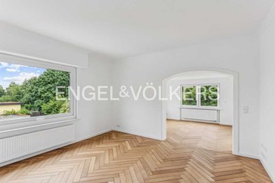 Exklusive 3,5-Zimmer-Wohnung mit Wintergarten, Designerbad und idyllischem Gartenparadies
