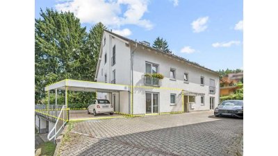 Mörlenbach: 3-Zimmer-Eigentumswohnung mit großer Terrasse, Carport und zusätzlichem Gästezimmer