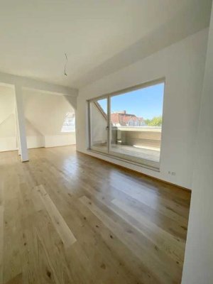 *ERSTBEZUG* Traumhafte Dachgeschosswohnung mit FBH, Abstellraum, Gäste-WC & Loggia - WE 22