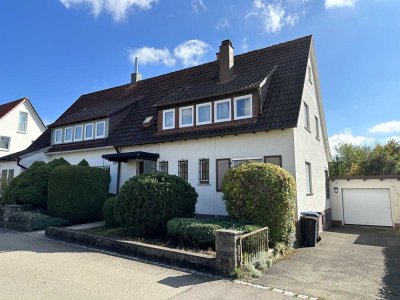 Doppelhaushälfte mit großem Potenzial – gestalten Sie Ihr Traumhaus mit Garten und Garage!