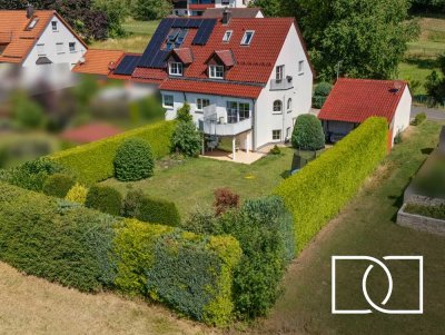 Sofort bezugsfertig! Energieeffiziente Doppelhaushälfte mit großem Garten, Doppelgarage und ELW