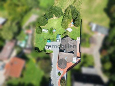 Charmantes Einfamilienhaus mit Wintergarten, Kaminofen und großzügigem Grundstück