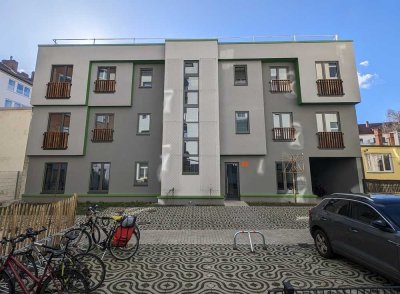 Moderne 3 Zi.-Wohnung im 1. OG mit offener Wohnküche (KfW-Effizienzhaus 40 Plus)