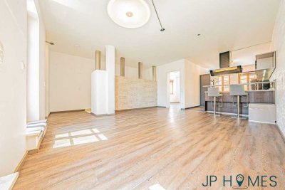 Exklusive 2-Zimmer-Maisonettewohnung mit Dachterrasse und Wasserzugang