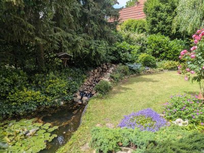 Wohnen im EG  mit Wintergarten und Garten mit kleinerTeichanlage zur Alleinnutzung