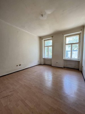 Kompakter Altbau mit Potenzial – 1-Zimmer-Wohnung in ruhiger Innenhoflage