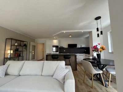 Erstbezug mit 3 Balkonen und EBK: Geschmackvolle 2-Raum-Wohnung mit 32m² Wohnküche
