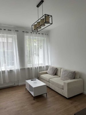 2 Zimmer Wohnung mit Terrasse und Garten!