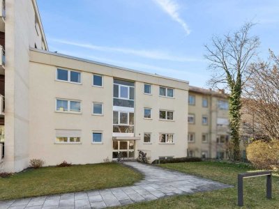 3-Zimmer-Wohnung mit Garten, Hobbyräumen und zwei Tiefgaragenstellplätzen in München-Gern