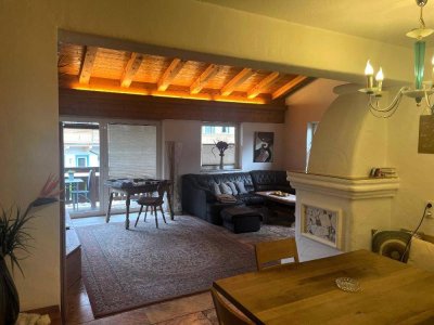 Lichtdurchflutete Mansardenwohnung mit Alpenflair und hochwertiger Ausstattung