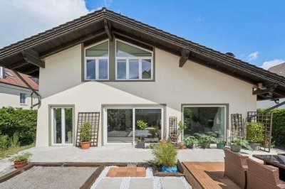 Einfamilienhaus mit Garten, Wintergarten und Einliegerappartement