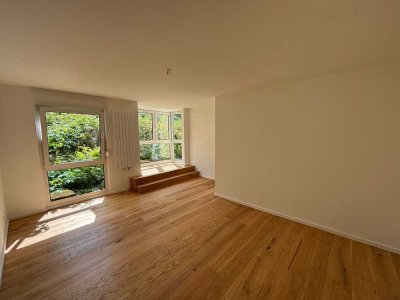 Lichtdurchflutete neu renovierte Maisonette-Wohnung mit eigenem Garten - wie im eigenen Haus
