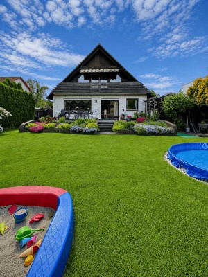 Mehr Raum fürs Leben - Familienhaus mit Pool, Gartenparadies, Dachterrasse & vollunterkellert