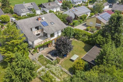 Ihr neues Zuhause in Toplage: Vielseitiges Wohnhaus mit Einliegerwohnung & Gartenparadies