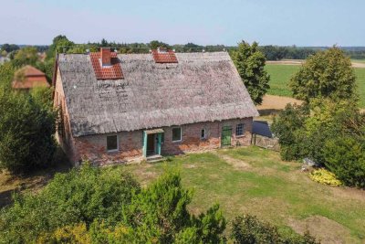 Jetzt Anpacken! Einfamilienhaus mit Gestaltungspotenzial auf romantischem Grundstück in Sorgenlos
