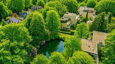 Urlaubsfeeling inklusive – Helle Wohnung mit Blick ins Grüne und Wasser + TG Platz