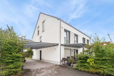 Engel & Völkers: Familienfreundliche Doppelhaushälfte in begehrter Lage von Bad Honnef