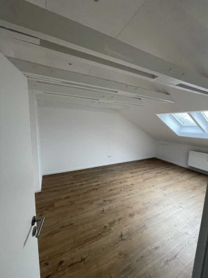 schöne 2-Zimmer-Dachgeschosswohnung in Putzbrunn