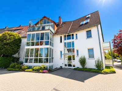 Wohnen mit Komfort – Ruhig gelegene Erdgeschosswohnung mit Wintergarten und Stellplatz