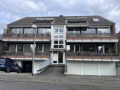 Freundliche und modernisierte 3-Zimmer-Wohnung mit zwei Balkon und direkten Gartenzugangin Meerbusch