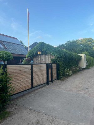 Wohnen am Berner Gutspark – Familienfreundliches Holzhaus mit Garten, Sauna & Loftcharakter