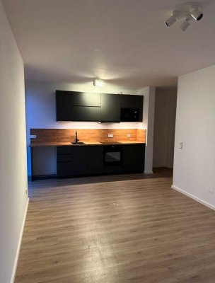 Stilvolle 1-Zimmer Wohnung mit Einbauküche & Garten