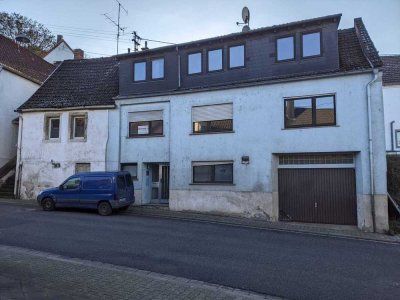 Ein bis Zwei Familien Haus mit Garage