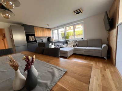 AXAMS : NEUWERTIGE, SEHR RUHIG GELEGENE 3-ZIMMER GARTENWOHNUNG