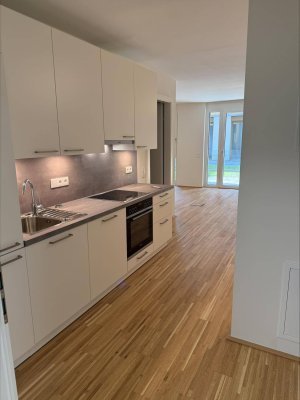 Erstbezug: Gartenwohnung, 1-Zimmer in perfekter Lage Nähe U1 Kagraner Platz