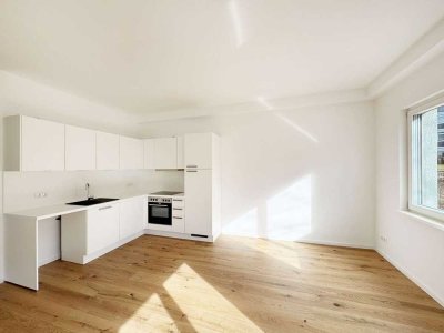 Ihr Ruhepol im PS96: 2 Zimmer, Terrasse und eigener Garten