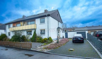 TOLLES ZWEIFAMILIENHAUS! Mit 580 m² Grundstück, Garage, Balkon & pflegeleichtem Garten zu verkaufen.