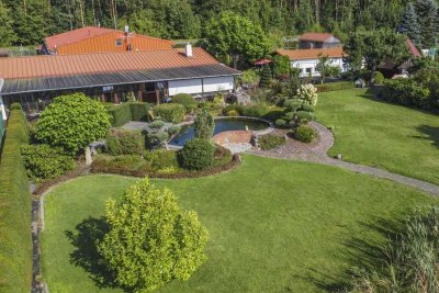 Direkt am See: Gepflegtes 4-Zi.-Zuhause mit einzigartigem Grundstück, Bootssteg und Einliegerwhg.