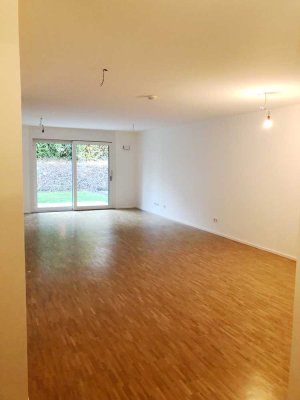 Moderne 2-Zimmer-Wohnung mit Einbauküche, Terrasse & Garten – Tiefgarage mit Stromanschluss