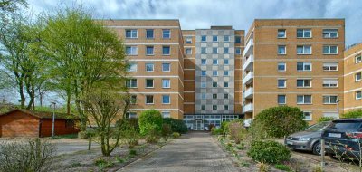 Modernisierte Eigentumswohnung mit Balkon/Wintergarten und Außenstellplatz in Schevemoor