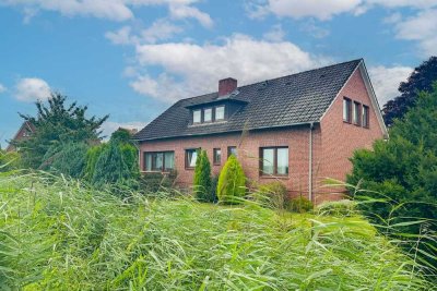 Gestaltbares Zuhause in Jork: EFH mit Südwest-Garten, Garagen und Sanierungsbedarf