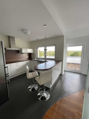 Freundliche 3,5-Zimmer-Wohnung mit Balkon und Einbauküche in Rockenberg