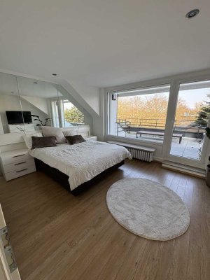 Möbilierte Dachgeschosswohnung mit 2 Terrassen