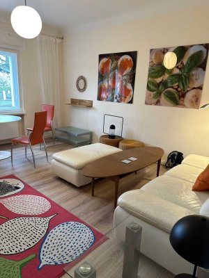 Stilvolle 2-Zimmer-Hochparterre-Wohnung mit geh. Innenausstattung mit Balkon und EBK