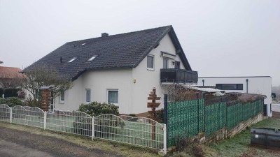 Sonnenverwöhntes Zweifamilienhaus mit Wohlfühlatmosphäre!