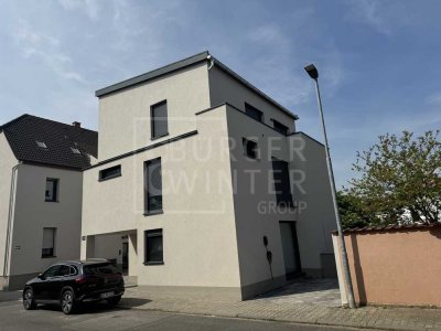 Moderne 4 Zimmer Maisonette-Wohnung mit Sichtbetonböden